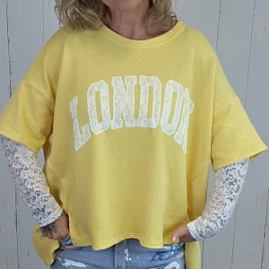 Birka oversized topp mørk gul/hvit