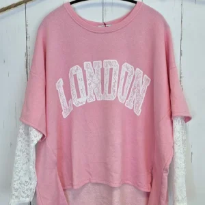 Birka oversized topp rosa/hvit